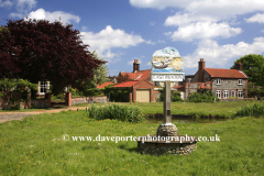 East Runton village sign on the village green