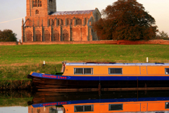 Narrowboat, St Marys Church, river Nene, Fotheringhay