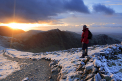 Walker on the summit of Hopegill head fell