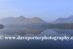 Misty dawn light over Derwentwater lake