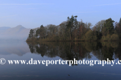 Misty dawn light over Derwentwater lake