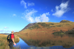 Walker, Grasmoor Fell, reflected in Crummock water