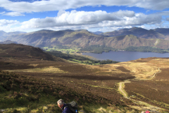 Walkers on Bleaberry fell overlooking Derwentwater