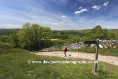 Walker near West Burton village, Wensleydale