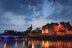 Dusk view over the river Great Ouse , Bedford town