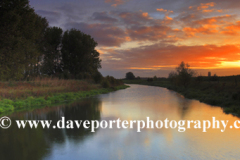 Autumn sunrise over Fenland drain waterway