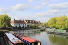 Narrowboats on the river Great Ouse; Ely City