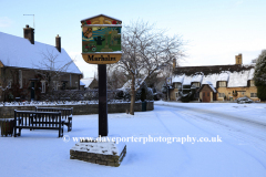 Winter snow on the village green; Marholm village