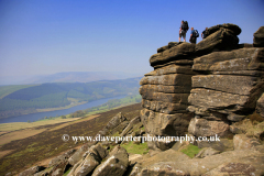 Walkers on Dovestone Tor Gritstone, Edge