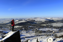 Winter walker on Curbar Edge