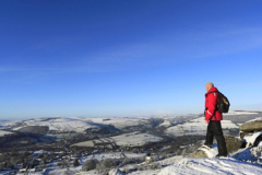 Winter walker on Curbar Edge