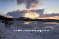 Sunrise over the frozen Kollafjordur lake