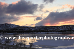 Sunrise over the frozen Kollafjordur lake