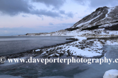 Sunrise over the frozen Kollafjordur fjord