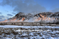 Winter sunrise over the Esja Mountain range