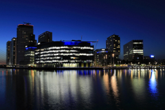 Nightime view over the Media City, Salford Quays, Manchester, Lancashire, England, UK