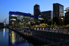 Nightime view over the Media City, Salford Quays, Manchester, Lancashire, England, UK