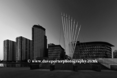 Sunset over the Media City Footbridge, Salford Quays, Manchester, Lancashire, England, UK