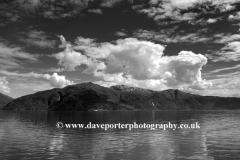 Reflections of mountains in Sognefjorden Fjord