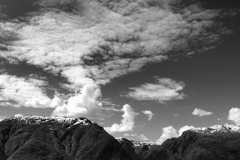 Reflections of mountains in Sognefjorden Fjord