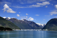 Reflections of mountains in Sognefjorden Fjord