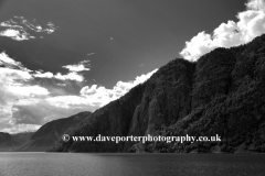 Reflections of mountains in Aurlandsfjorden Fjord