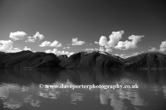 Reflections of mountains in Hardangerfjord Fjord