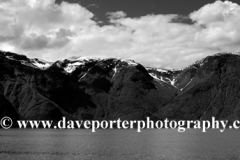 Reflections of mountains in Aurlandsfjorden Fjord