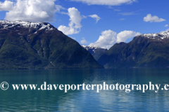 Reflections of mountains in Aurlandsfjorden Fjord