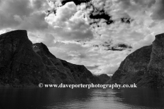 Reflections of mountains in Sognefjorden Fjord