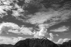 Reflections of mountains in Hardangerfjord Fjord