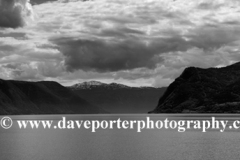 Reflections of mountains in Aurlandsfjorden Fjord