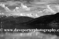 Reflections of mountains in Sognefjorden Fjord