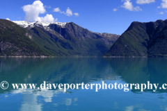 Reflections of mountains in Hardangerfjord Fjord