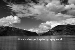 Reflections of mountains in Aurlandsfjorden Fjord