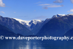 Reflections of mountains in Hardangerfjord Fjord