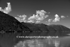 Reflections of mountains in Hardangerfjord Fjord