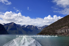 Reflections of mountains in Aurlandsfjorden Fjord