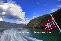 Norwegian flag, tourist boat in Aurlandsfjorden Fjord