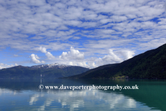 Reflections of mountains in Sognefjorden Fjord