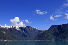 Reflections of mountains in Hardangerfjord Fjord