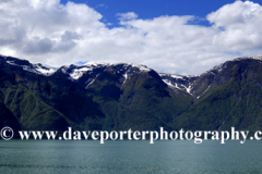 Reflections of mountains in Aurlandsfjorden Fjord