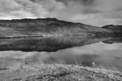 Reflections in Loch Gleann Dubh, Kylesku village